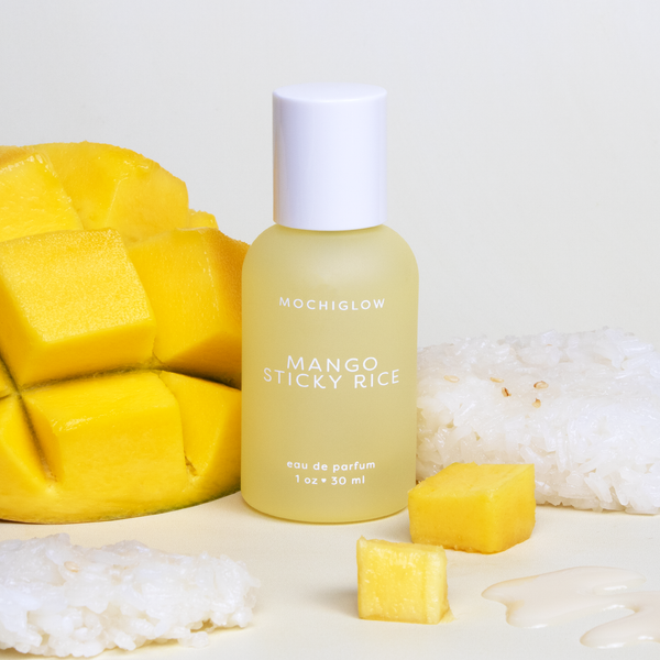 Mango Sticky Rice Asian Dessert Perfume by Mochiglow. Smells like juicy mango, thai sticky rice, coconut, and condensed milk. In a cute yellow pastel perfume bottle.