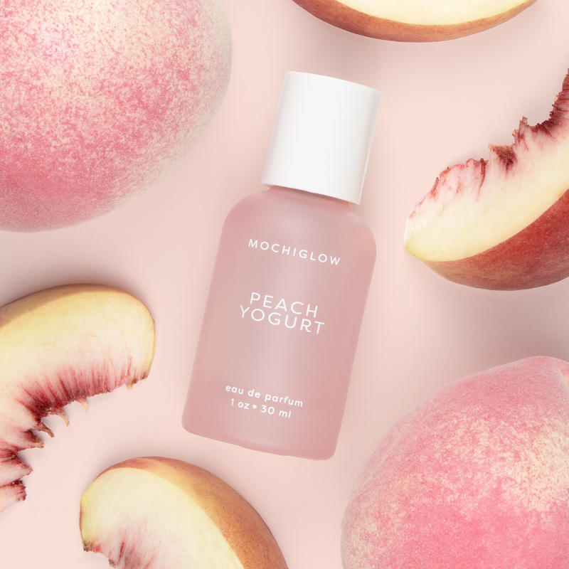 Peach Yakult Inspired Scented Perfume with notes of white peach and yogurt. Cute peach pastel colored perfume bottle. Mochiglow collection inspired by Asian desserts and drinks. 