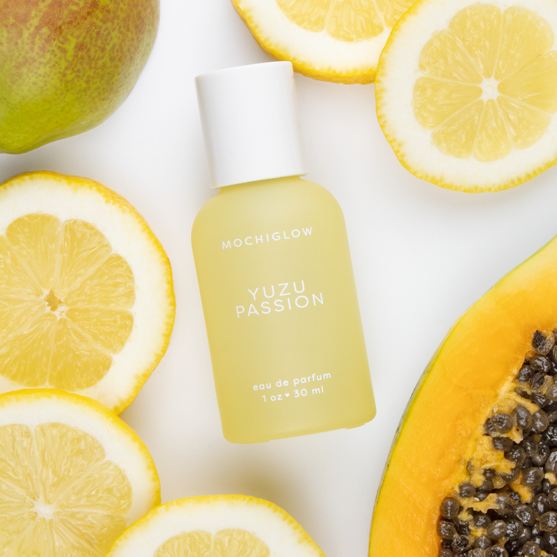 A tropical perfume inspired by Yuzu, passion fruit, pink guava sorbet, green papaya, dragonfruit, and vetiver. An Asian dessert and drink inspired collection by Mochiglow. Bottled in a cute pastel yellow glass bottle with white lid. 